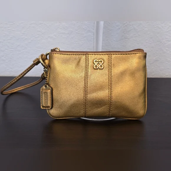 Coach Metallic Leather Gold Wristlet Clutch With Hot Pink Interior - Picture 1 of 10